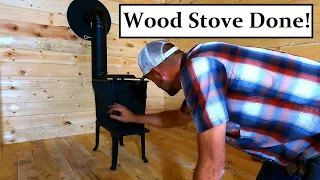 #523 - Installed Wood Stove And Chimney In Tiny Cabin
