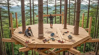 This man is building a two-room treehouse at the top of a 150-year-old tree!