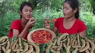Yummy mouth watering food - Green tamarind fruit with Hot salt chili - Show eating delicious