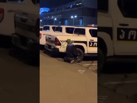 Writing #ACAB on cop cars during the anti-government #protests in #Tbilisi, #Georgia