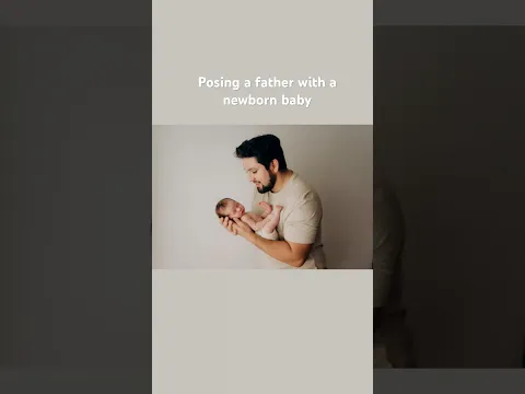 Posing a father with a newborn baby