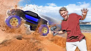 RC Car Jumps At The Red Sand Beach