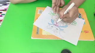 Coloring the picture of a halloween witch