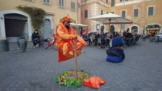 Levitation man trick, but what doing this floating man?